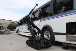 CALIBER® MK4 lvbied robot inspecting bus