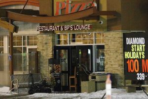 Police robot enters a Boston Pizza on McPhillips